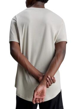 T-Shirt Calvin Klein Jeans Badge Tourner Beige