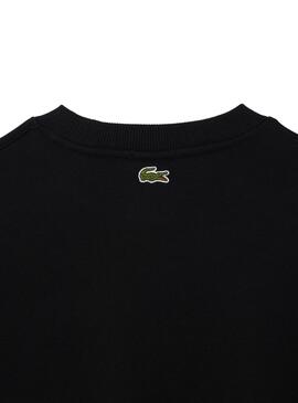 Sweat Lacoste Loose Noire pour Homme et Femme