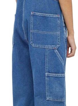 Salopette Dickies en jean bleu lavé pour fille.