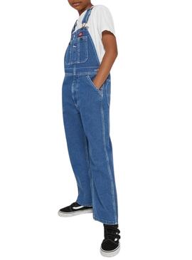Salopette Dickies en jean bleu lavé pour fille.