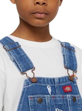 Salopette Dickies en jean bleu lavé pour fille.