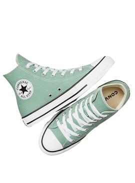 S'il vous plaît, donnez-moi juste la traduction en français de ceci : Baskets Converse Chuck Taylor Turquoise pour femmes.