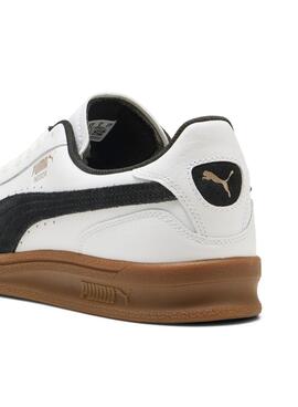 Chaussures Puma Indoor blanches pour hommes.