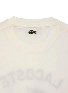 T-shirt Lacoste avec logo imprimé blanc pour homme et femme.