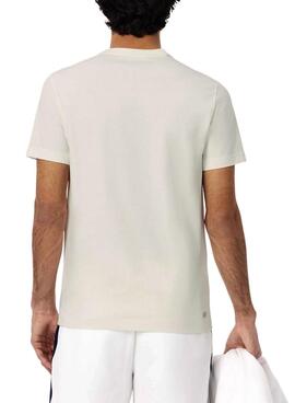 T-shirt Lacoste tennis avec imprimé René Lacoste beige pour homme.