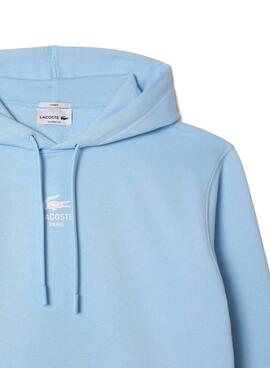 Sweat à capuche Lacoste à imprimé bleu pour homme et femme.