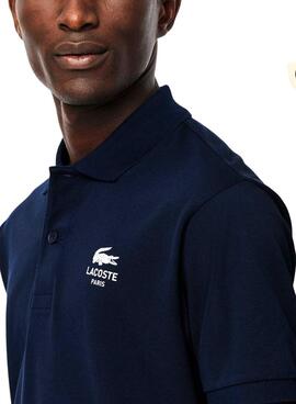 Polo Lacoste L.12.12 con estampado del logo marino para hombre y mujer