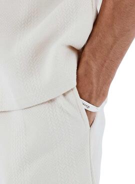 Proyecto Bermuda X Paris en punto beige para hombre.