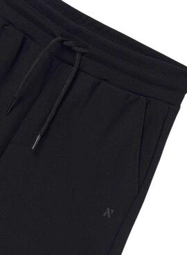Bermudes sportives de base noires pour enfant.