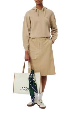 Sac fourre-tout Lacoste en toile beige de grande taille.