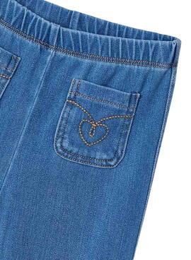 Leggings Mayoral en denim tricoté bleu évasé pour fille.