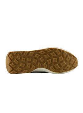 Chaussures New Balance 370 CC blanches et vertes pour hommes et femmes.
