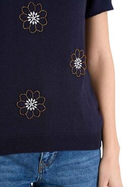 Pull Naf Naf bleu marine avec broderies pour femme.