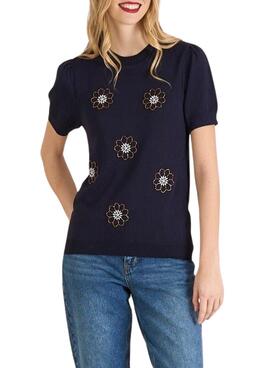 Pull Naf Naf bleu marine avec broderies pour femme.