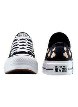 S'il vous plaît, rendez-moi simplement la traduction en français de ceci : Baskets Converse Chuck Taylor All Star Plateforme Animal Print noir pour femmes
