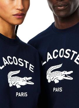 T-shirt Lacoste avec logo bleu marine pour femme et homme.