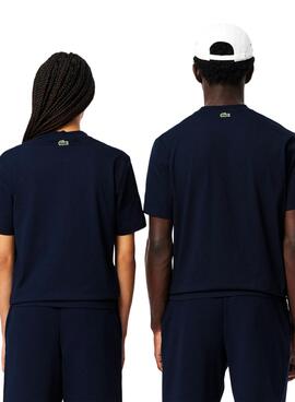 T-shirt Lacoste avec logo bleu marine pour femme et homme.