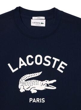 T-shirt Lacoste avec logo bleu marine pour femme et homme.