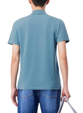 Polo básico Lacoste azul con cuello de canalé para hombre.