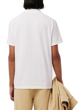 Polo Lacoste à manches côtes blanc pour homme.