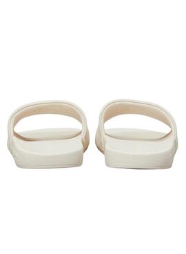 Tongs Calvin Klein monogramme beige pour femme