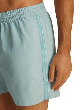 Maillot de bain Calvin Klein logo tape turquoise pour homme.