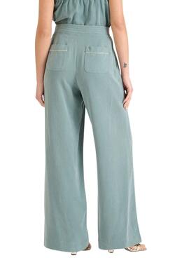 Pantalon Naf Naf Gala vert turquoise pour femme.