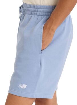   Bermuda New Balance Essentials bleu pour homme.