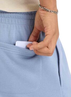   Bermuda New Balance Essentials bleu pour homme.