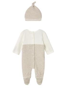 Bodysuit Mayoral beige et casquette pour bébé.