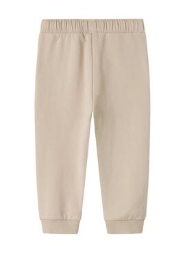 Pantalon jogger Name It Mobie beige pour enfant.