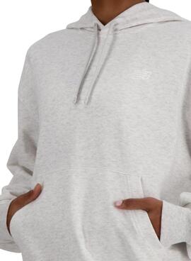 Sweat à capuche basique New Balance gris pour femme.