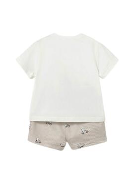 Ensemble Mayoral comprenant un t-shirt avec un ours et un short à rayures beige pour bébé.
